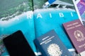 Milan, Italy - June 2023: Travel documents on a tourist magazine ready for the Caraibi tour. Holidays concept. Holiday