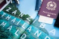 Milan, Italy - June 2023: Travel documents on a tourist magazine ready for the Zanzibar Thailand Maldives tour. Holidays