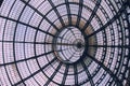 Bottom view to geometric glass ornate round roof of Galleria Vittorio Emanuele II,Milan,Italy Royalty Free Stock Photo