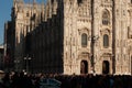 Milan, Italy - March 23, 2019: Duomo. People in front of facade of italian gothic church in the centre of Milan, Italy