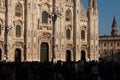 Milan, Italy - March 23, 2019: Duomo. People in front of facade of italian gothic church in the centre of Milan, Italy