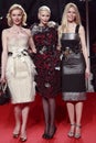 MILAN, ITALY - MARCH 02: Eva Herzigova, Nadja Auermann and Claudia Schiffer attend the Extreme Beauty In Vogue party at the Royalty Free Stock Photo