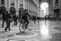 Milan, Italy - March 23, 2016: Man rides a bicycle in the cente