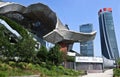 MILAN, ITALY- May, 2020: futuristic roof of the MiCo congress center and the Three Towers skyscrapers of City Life district