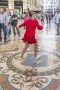 Tourist tradition in the Gallery of Victor Emmanuel II, Milan