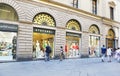 Tourists walking at the famous shops of Milan city Italy