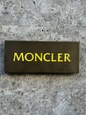 Milan , Italy - 27. 11 2023 : MONCLER logo brand and text sign chain facade store wall exterior. MONCLER is a world