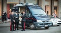 Armed policemen in front of their police truck Royalty Free Stock Photo