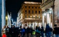 Long exposure of xmas shoppers at Corso Vittorio Emanuele ii near Duomo in Milan, Lombardy, Italy on a cold November Royalty Free Stock Photo