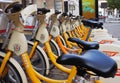 Milan, Italy - November 20, 2019: Mobike dockless bicycles parked in a street.