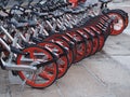 Milan, Italy - November 20, 2019: Mobike dockless bicycles parked in a street.