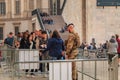 Soldiers monitor and control tourists at the entrance of Milan C