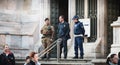 Soldiers monitor and control tourists at the entrance of Milan C