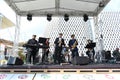 The Polish musical band plays in front of the facade of the Polish pavilion of Expo Milano 2015.