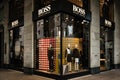 Milan, Italy - October 9, 2016: Shop window and entrance of a Hugo Boss shop in Milan, Italy. Few days after Milan Fashion Week. Royalty Free Stock Photo