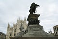 Milan, Italy, October 2021: Statue of Vittorio Emanuele II at Piazza Duomo overlooking the Milan Cathedral