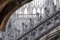 Photo taken high up in the terraces of Milan Cathedral / Duomo di Milano, showing the gothic architecture in detail.