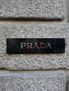 Milan , Italy - 27. 11 2023 : prada logo brand and text sign chain facade store wall exterior. Prada is a world famous