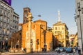 Milan, Italy, September 8, 2018: Basilica di San Babila church with clock tower and column