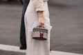 Milan, Italy - September 21, 2023: fashioner wearing Gucci Ophidia shoulder bag. Fashion blogger outfit details