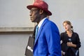 Man with blue jacket and red Borsalino hat before Tods fashion show, Milan Fashion Week street Royalty Free Stock Photo