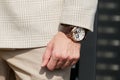 Man with Patek Philippe Tourbillon watch before Gucci fashion show, Milan Fashion Week street