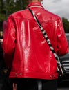 Milan, Italy - September, 21, 2022: man wearing Red rayon-cotton blend cotton J-Lou patent shirt jacket from DIESEL