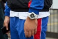 Man with white Casio G Shock watch before Fila fashion show, Milan Fashion Week street style