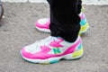 Man with white, pink and blue New Balance sneakers before Fendi fashion show, Milan Fashion
