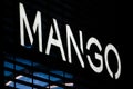 Mango logo displayed on a facade of a store in Milan