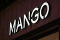 Mango logo displayed on a facade of a store in Milan