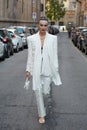 Mary Leest with white jacket and trousers before Sportmax fashion show, Milan Fashion Week