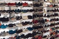 MILAN, ITALY - SEPTEMBER 13, 2017: modern sneakers in shoe store. New models of sportive footwear by famous brands