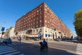 MILAN, ITALY - September 06, 2016: Pedestrians and woman driving on the scooter on the crossroad Via Giovanni Pierluigi da Palest