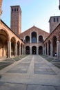 Tourists in the courtyard of the church of the Basilica of Santo Ambrogio