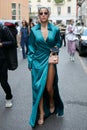 Woman with blue silk dress and Dior bag before Alberta Ferretti fashion show, Milan Fashion