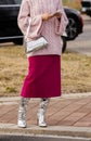 Milan, Italy - September, 23: woman influencer wearing metallic silver minimalist shoulder bag from Zara. Fashion