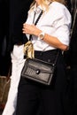 Milan, Italy - September, 23: woman influencer wearing serpenti diamond blast small crossbody bag from Bulgari. Fashion