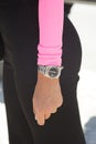 Woman with Rolex Datejust watch and pink shirt before Msgm fashion show, Milan Fashion Week