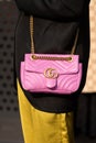 Milan, Italy - September, 23, 2022: woman wearing purple quilted leather GG Marmont medium matelasse shoulder bag from