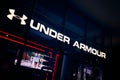 Milan, Italy - 17.12.2020. Under Armour logo signboard of the store. Under Armour is an American sports equipment Royalty Free Stock Photo