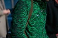 Man with green zebrine overalls before Emporio Armani fashion show, Milan Fashion Week street style on January Royalty Free Stock Photo