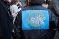 Man with peace symbol with mice on his bomber back before Wood Wood fashion show, Milan Fashion Week street