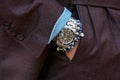 Man with steel Rolex Submariner watch and blue bracelets before Salvatore Ferragamo fashion show, Milan Royalty Free Stock Photo