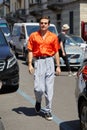 Carlo Sestini with orange shirt before Sartorial Monk fashion show, Milan Fashion Week street style on June 18,