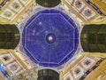 Milan, Lombardy ITALY - December 23, 2017, Dome of Gallerie Vittorio Emanuele II decoraded with hoidays lights and crhsitmas tree Royalty Free Stock Photo