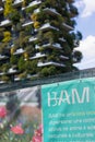 Milan, Lombardy, Italy - MAY, 5, 2024: the BAM - Biblioteca degli Alberi park sign with the Bosco Verticale in the background Royalty Free Stock Photo