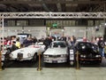 Milan, Lombardy Italy - November 23 , 2018 - From left to right, white Lancia Aurelia B24 S Spider 1955, Silver BMW 3.0 CSL -Batmo