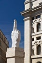 Sculpture of Cattelan`s finger in front of the Milan Stock Excha