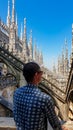 Milan - Male tourist with external view of Milan Cathedral (Duomo di Milano) from the Piazza del Duomo Royalty Free Stock Photo